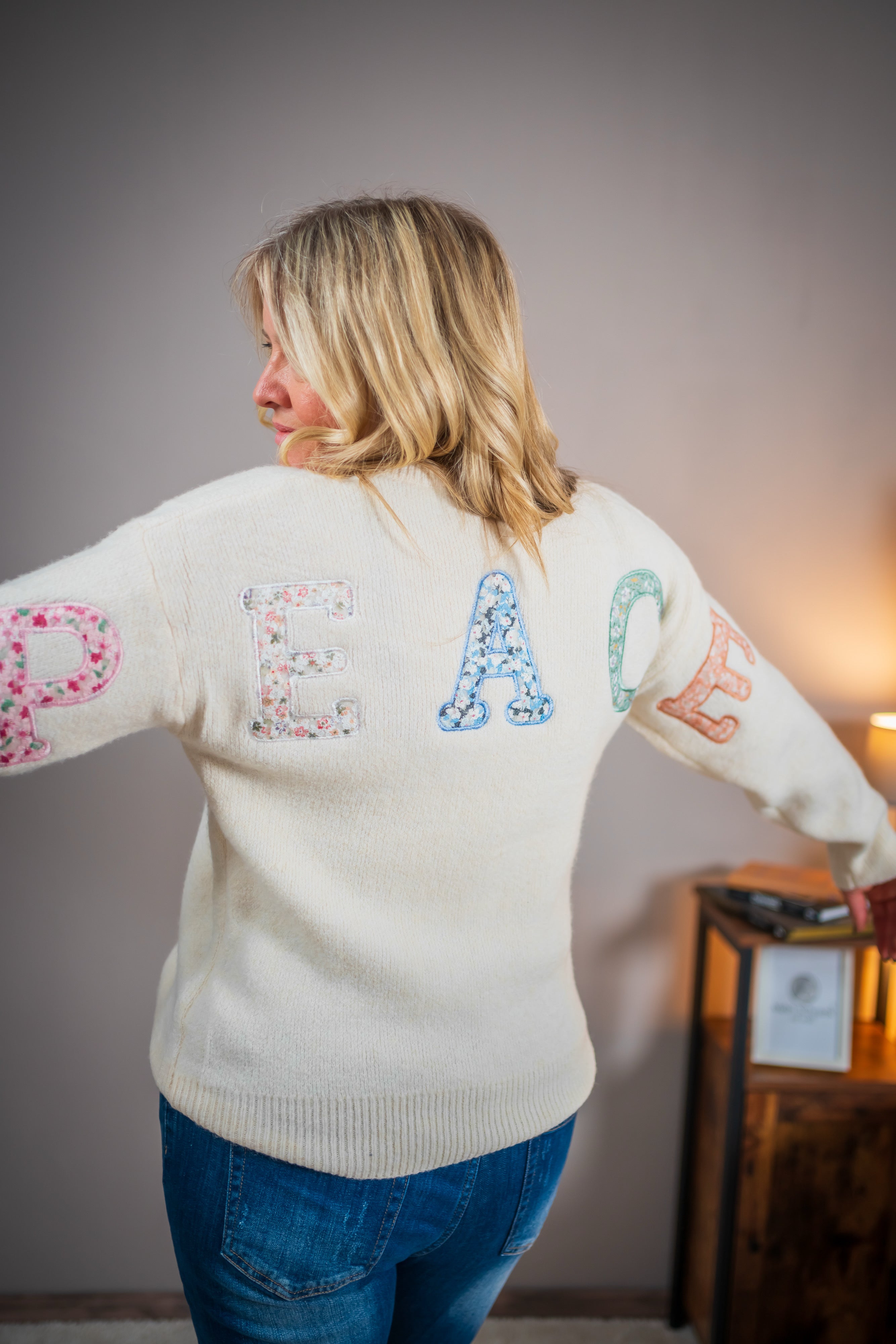 Strickpullover mit Beflockung, wollweiß