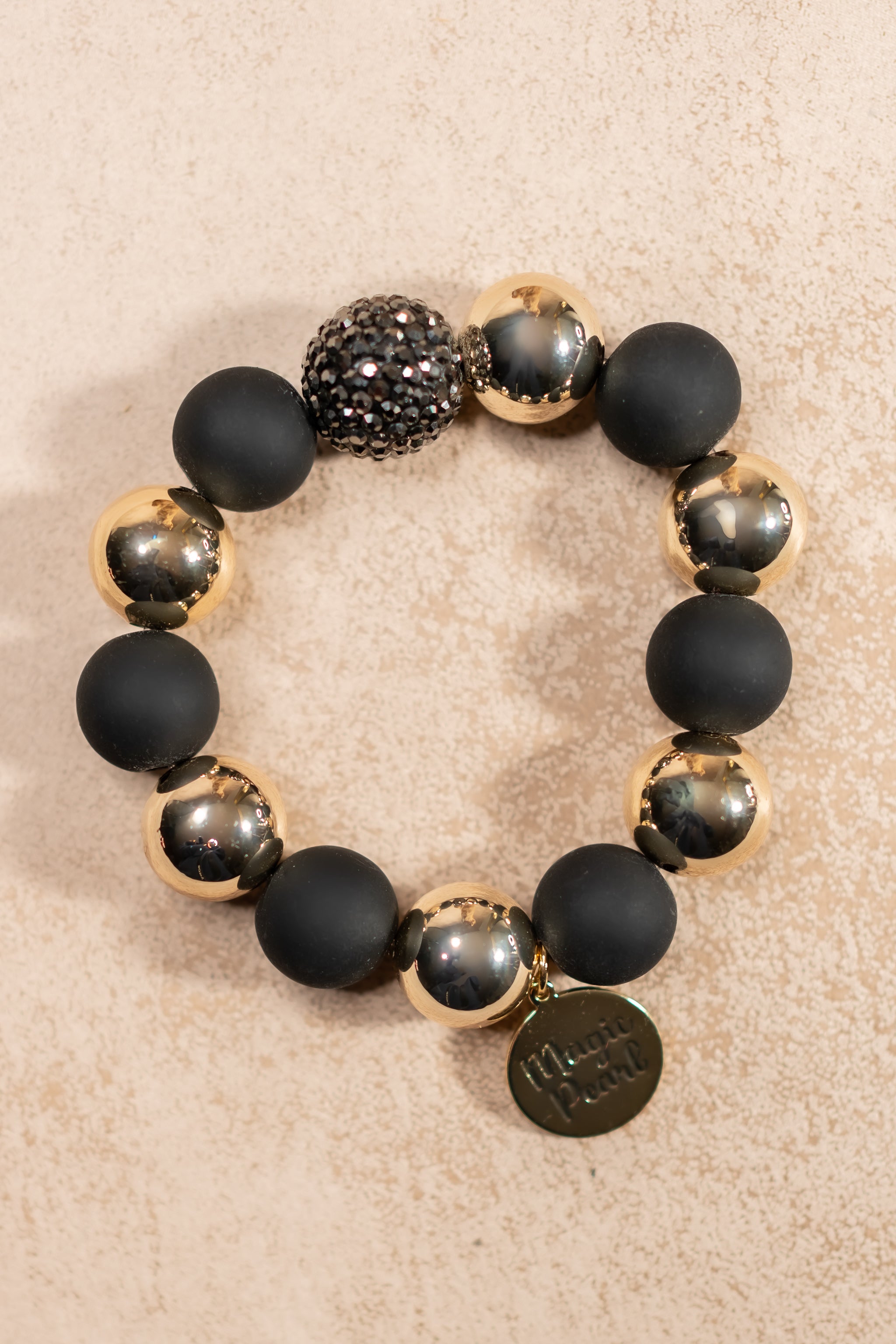 Perlenarmband Midnight Sparkle in Gold