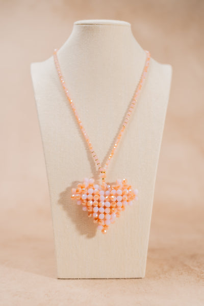 Halskette mit Herzanhänger, rosa