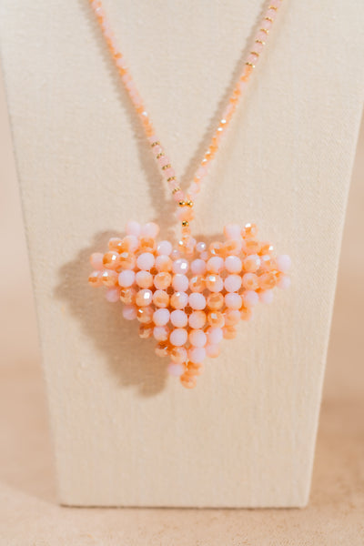 Halskette mit Herzanhänger, rosa