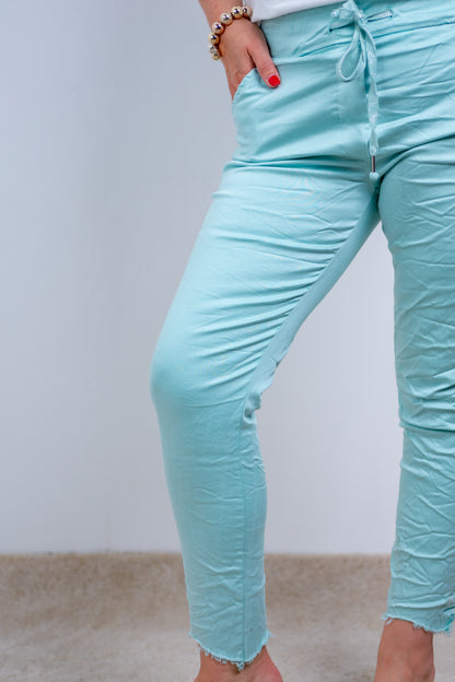 Stretchhose mit Fransen am Saum, mint