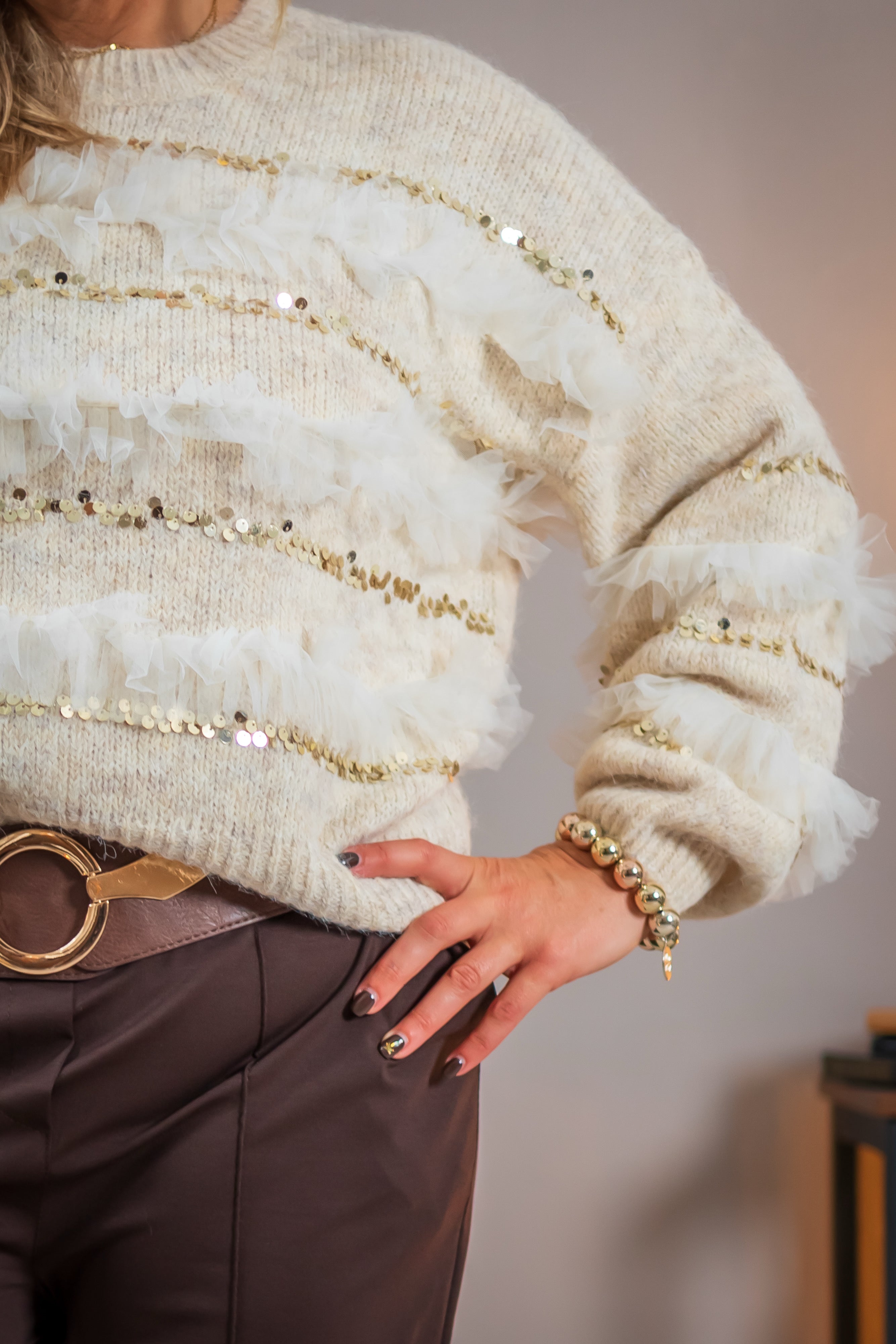 Strickpullover mit Rüschen und Pailetten