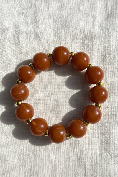 Armband aus Acryl in Braun-marmoriert mit Golddetails