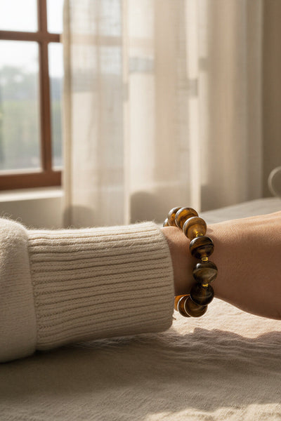 Armband aus Acryl im Braunmix mit Golddetails