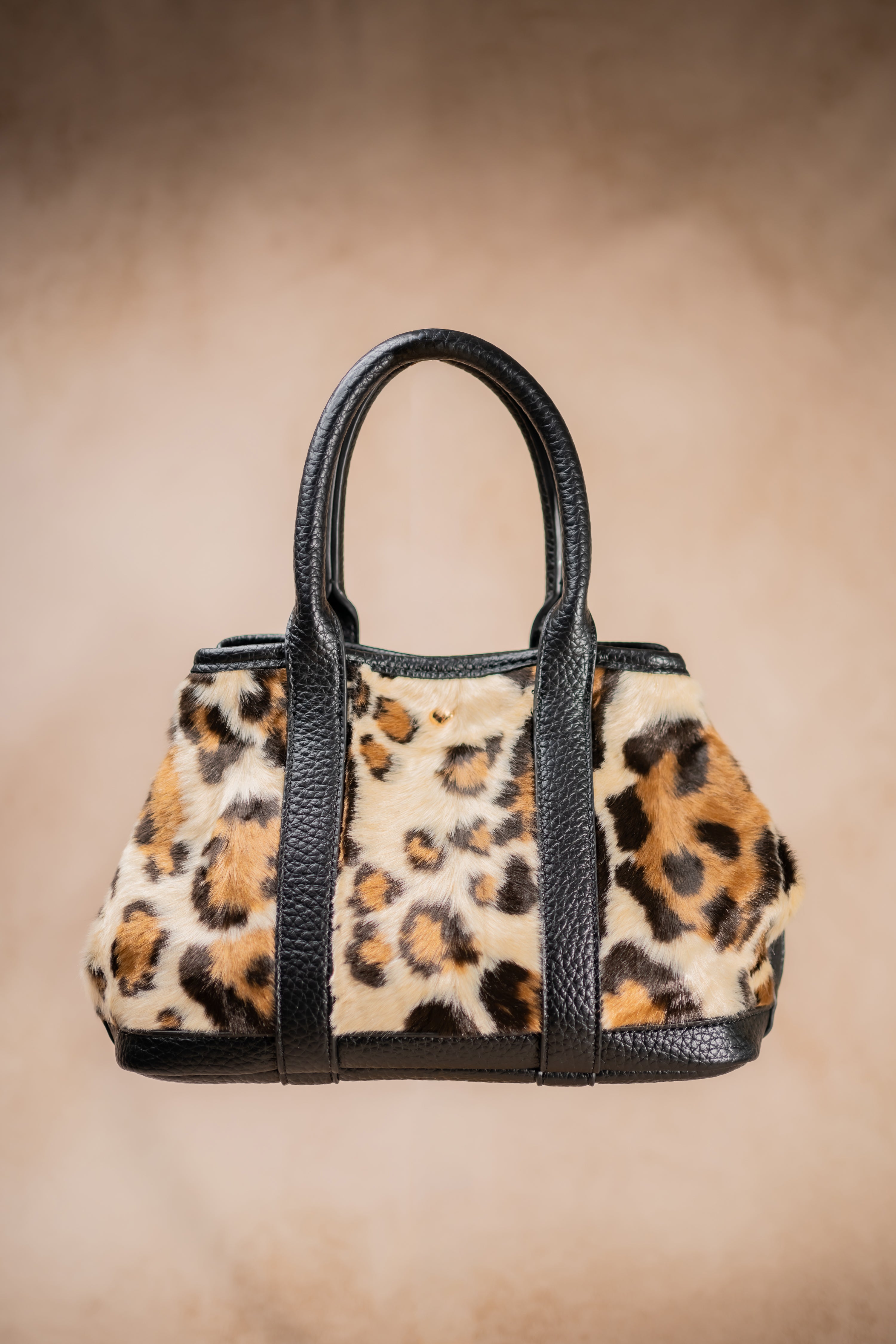 Handtasche mit Leo-Fellimitat