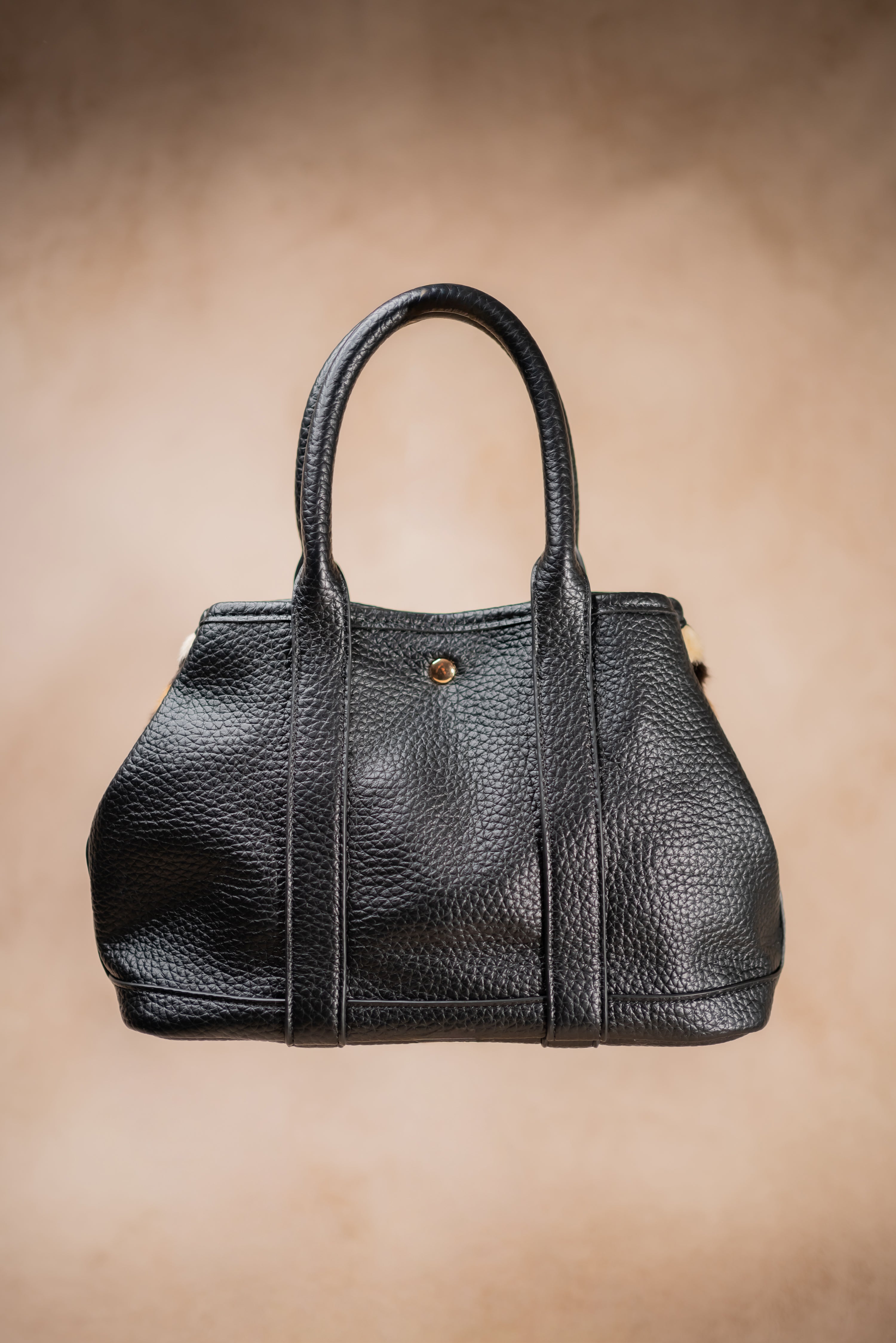 Handtasche mit Leo-Fellimitat