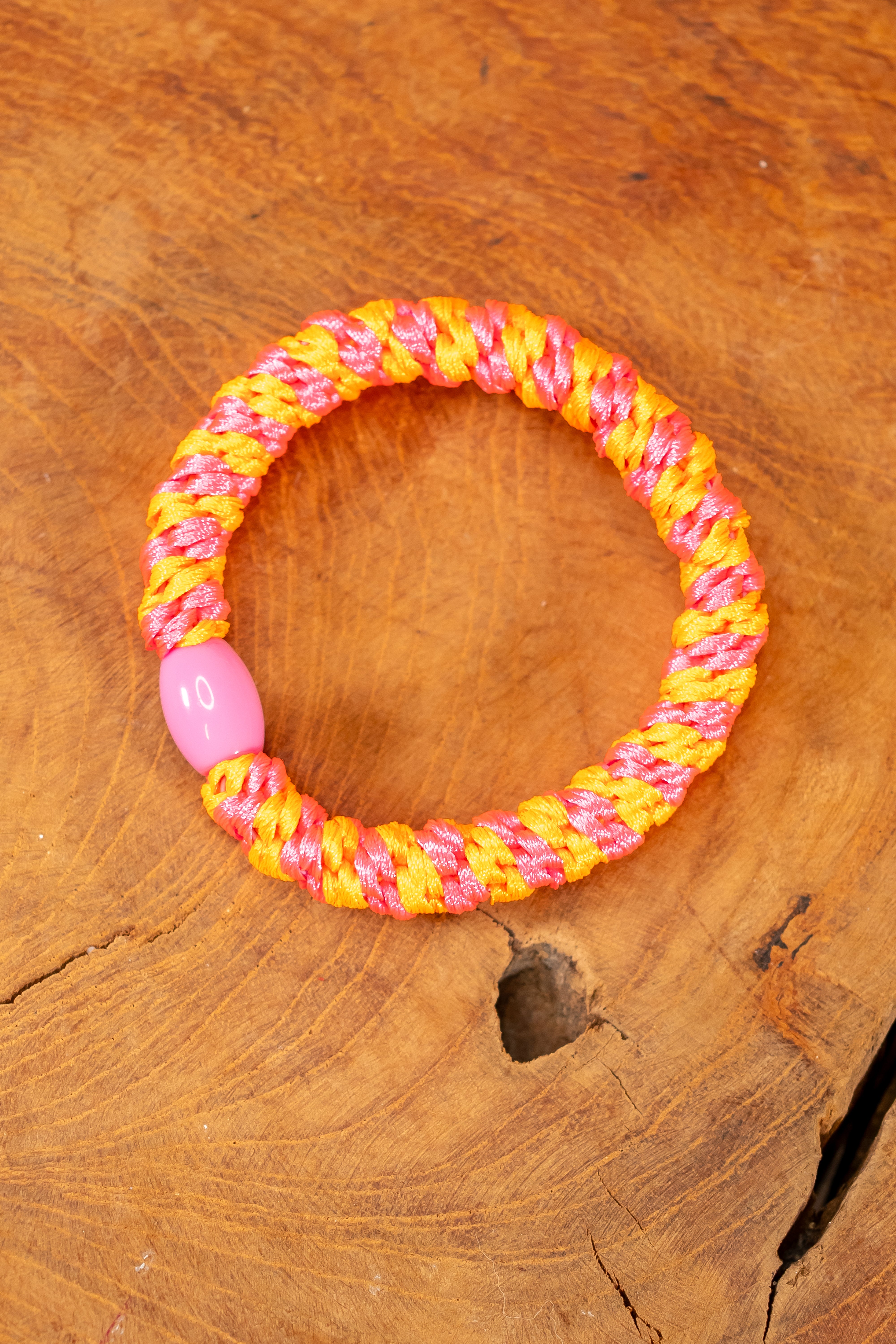 Geflochtenes Haargummi, pink-orange