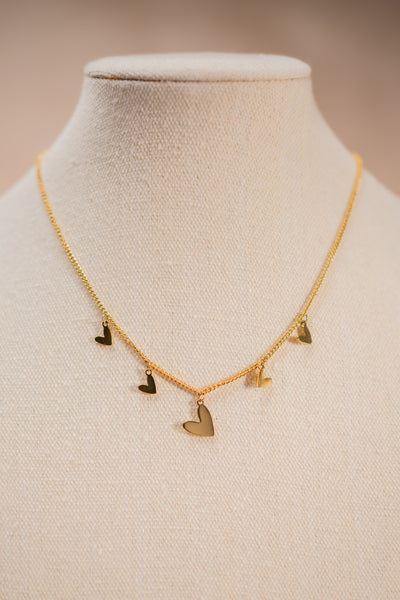Halskette mit kleinen Herzanhängern, gold