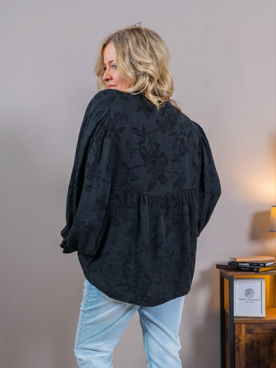 Bluse mit floralem Muster und Fledermausärmeln, schwarz