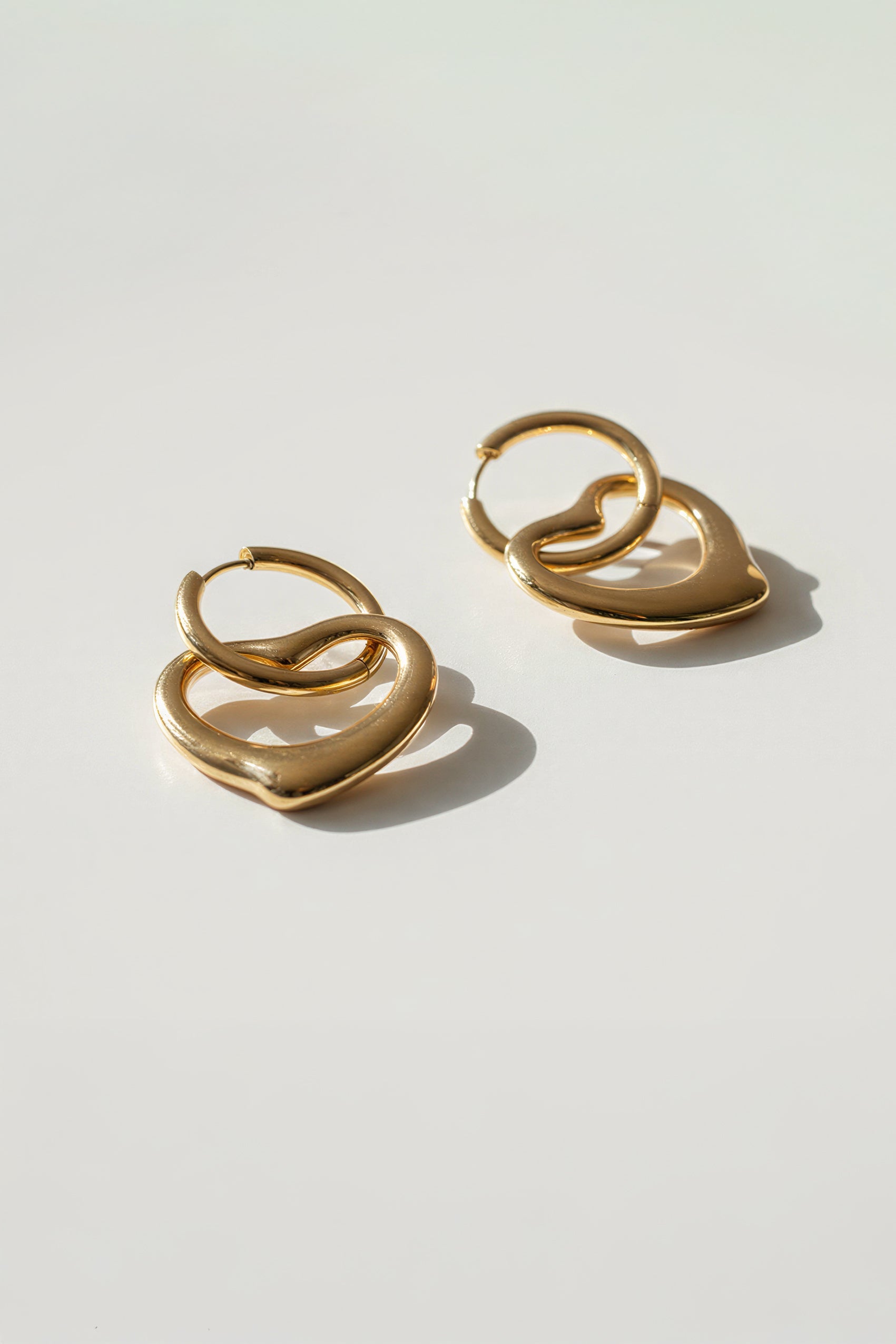 Creolen mit Herzanhänger