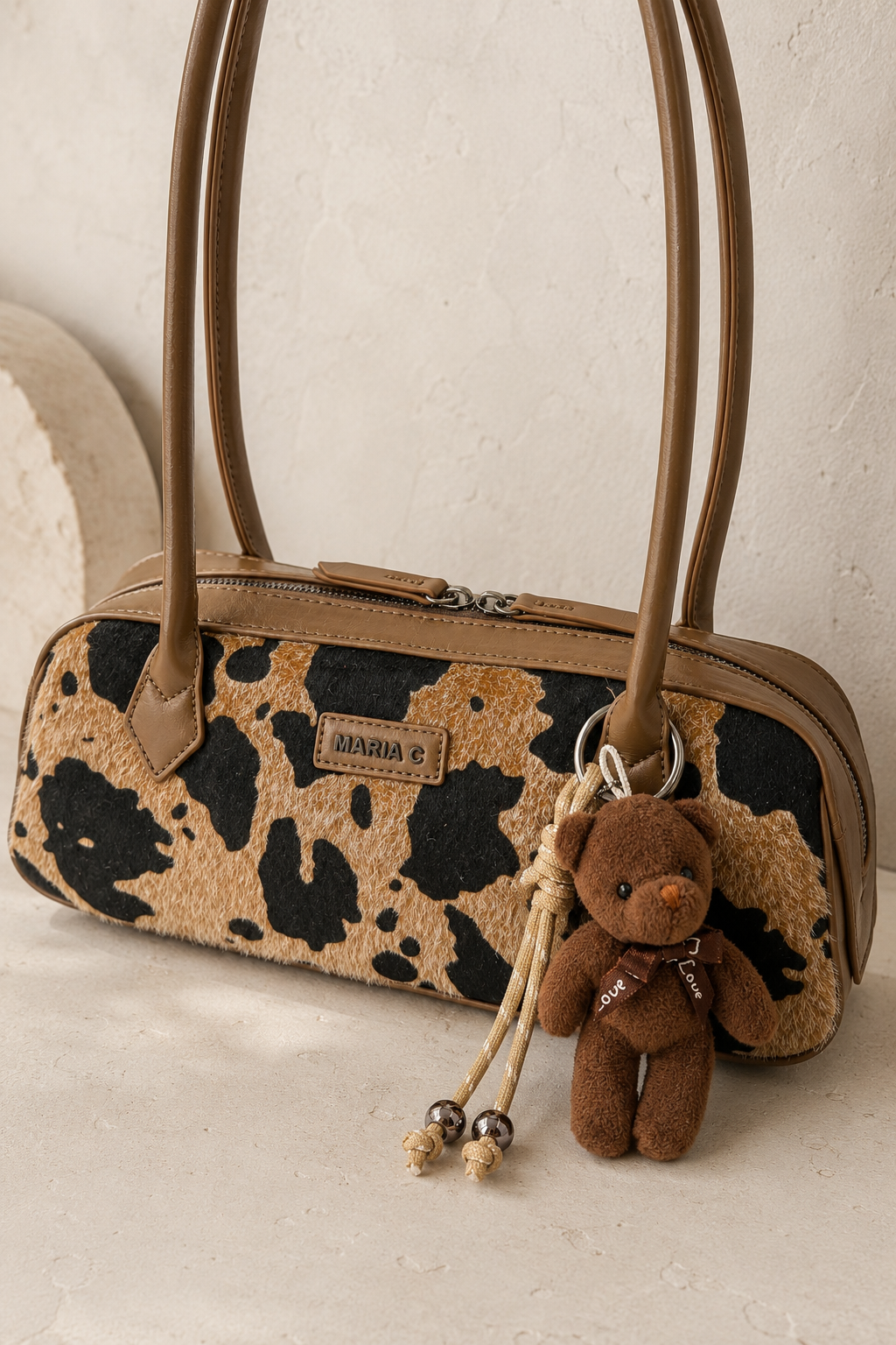 Elegante Vintage Baguette-Tasche mit Animal-Print & Teddy-Anhänger