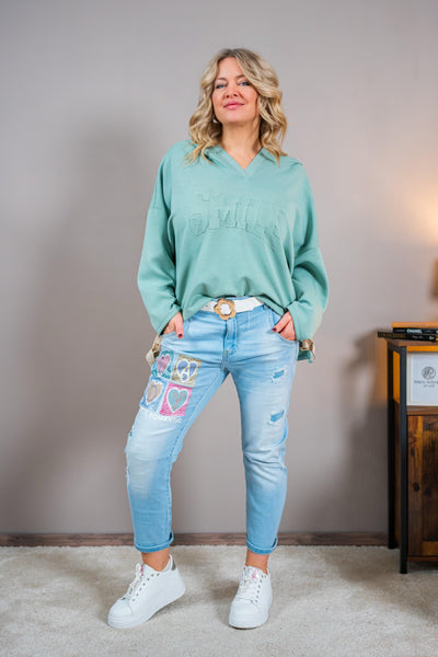 Jeans mit Patches und Schriftzug, hellblau