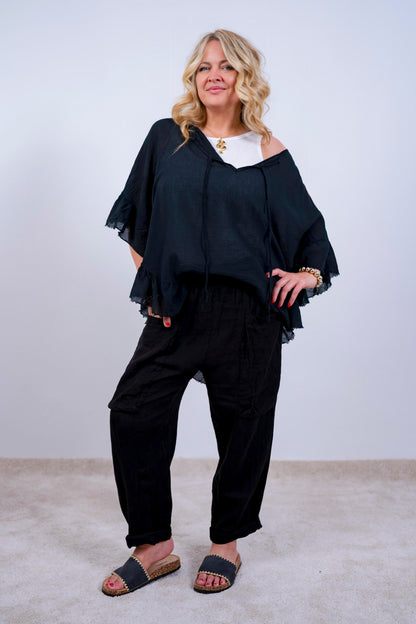 Volant-Bluse mit ausgefransten Saum, schwarz