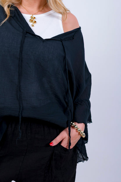 Volant-Bluse mit ausgefransten Saum, schwarz