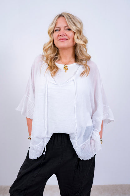 Volant-Bluse mit ausgefransten Saum, weiß