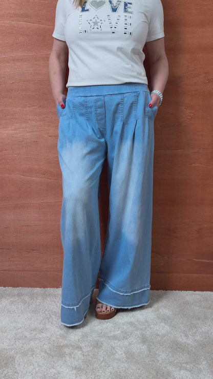 Weite Jeanshose mit Fransen